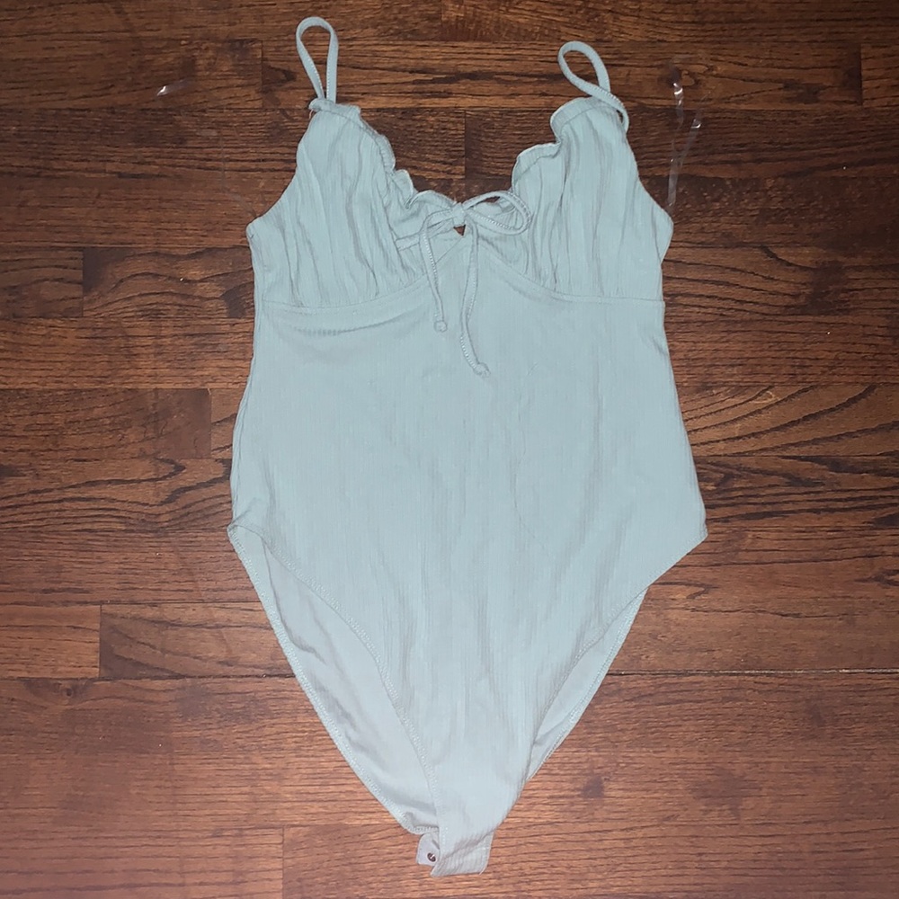 Teal bodysuite (never worn/ too big for me)